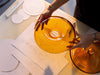Why We Embrace Hand-Shaped Amber Glass